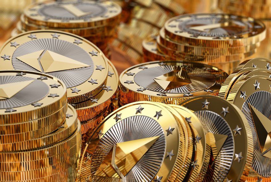 Messy piles of physical gold and silver Ether coins.