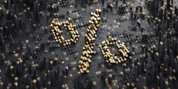 Percentage sign made up of gold particles on a black background.