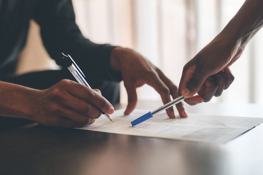 banking loan signing contract finance two hands